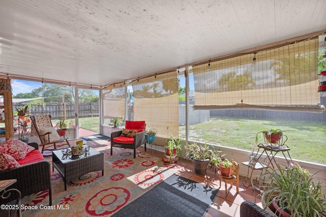 6640 Dock Ave, Cocoa, FL 32927 - sunroom / solarium with an outdoor hangout area