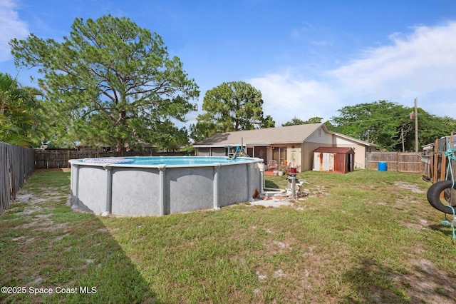 6640 Dock Ave, Cocoa, FL 32927 - fenced backyard with a storage unit