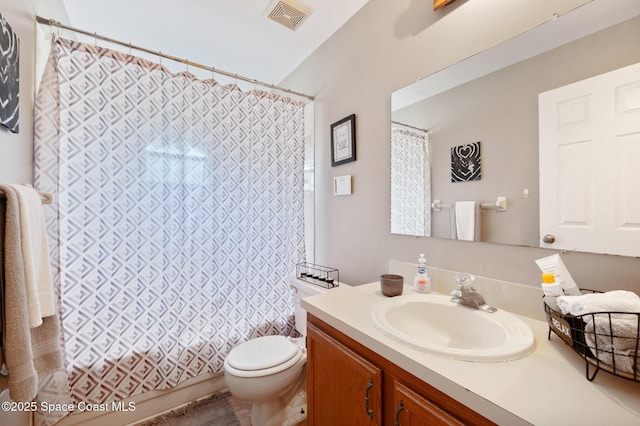 6640 Dock Ave, Cocoa, FL 32927 - bathroom featuring vanity and toilet