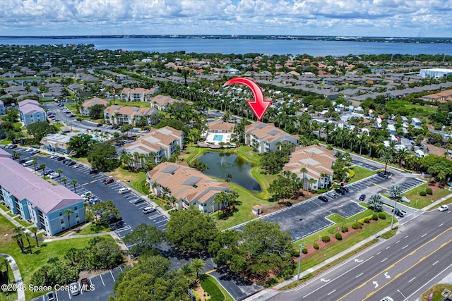 1951 Island Club Dr Unit 3-48, Melbourne, FL 32903 - aerial overview of property's location featuring a nearby body of water and nearby suburban area
