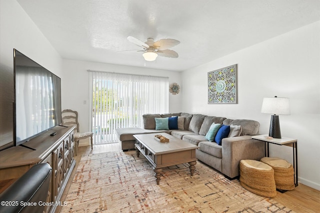 1951 Island Club Dr Unit 3-48, Melbourne, FL 32903 - living room with ceiling fan and light wood-type flooring