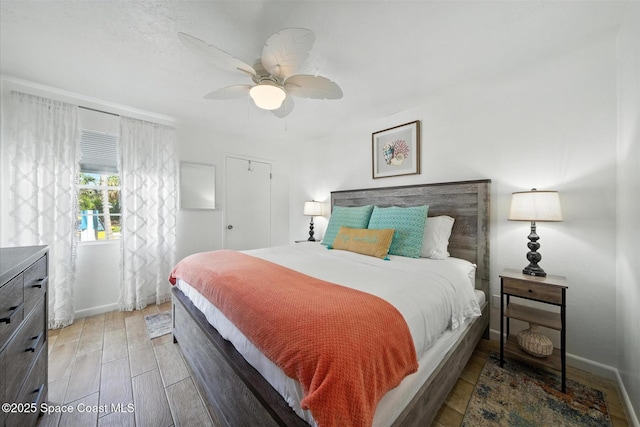 1951 Island Club Dr Unit 3-48, Melbourne, FL 32903 - bedroom featuring light wood finished floors and a ceiling fan