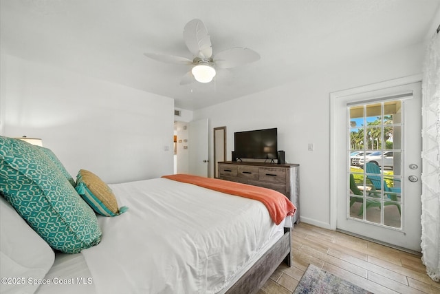 1951 Island Club Dr Unit 3-48, Melbourne, FL 32903 - bedroom with access to outside, wood finished floors, and ceiling fan