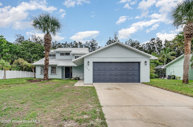 362 Nikomas Way, Melbourne Beach, FL 32951 - mid-century home featuring stucco siding, a garage, concrete driveway, and a metal roof