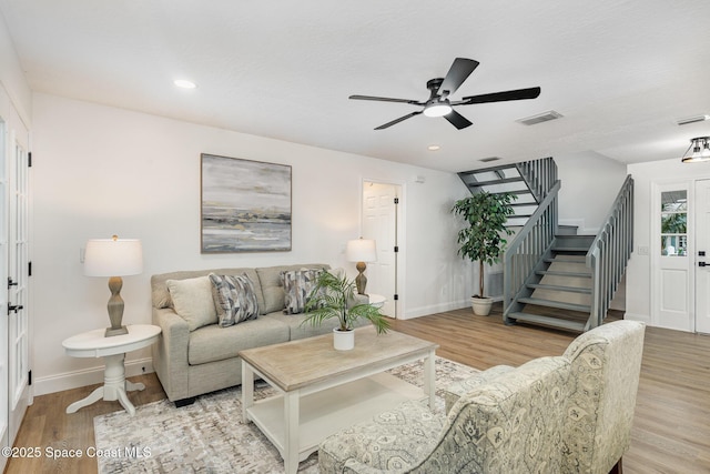 362 Nikomas Way, Melbourne Beach, FL 32951 - living area featuring stairs, wood finished floors, ceiling fan, and recessed lighting