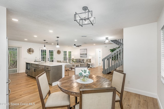 362 Nikomas Way, Melbourne Beach, FL 32951 - dining area featuring stairway, light wood-style flooring, recessed lighting, and ceiling fan