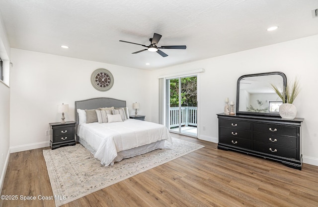 362 Nikomas Way, Melbourne Beach, FL 32951 - bedroom featuring access to exterior, wood finished floors, a ceiling fan, and recessed lighting