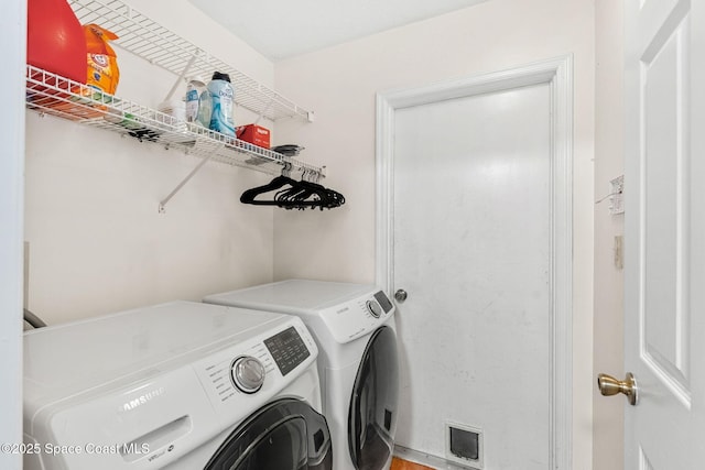 1745 Crane Creek Blvd, Melbourne, FL 32940 - laundry room featuring washer and clothes dryer