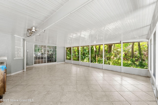 1745 Crane Creek Blvd, Melbourne, FL 32940 - unfurnished sunroom featuring tile patterned flooring