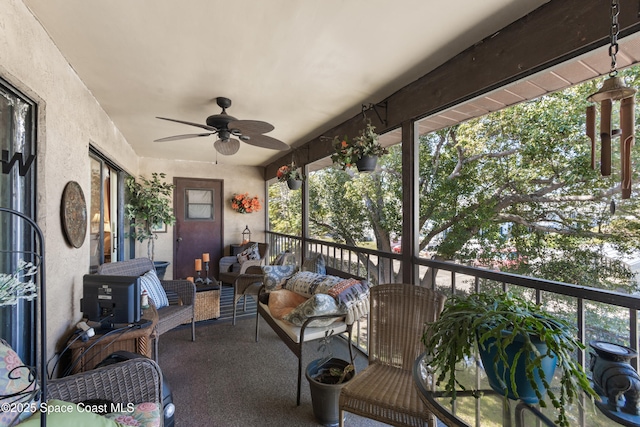 313 La Paloma Ln, Titusville, FL 32780 - balcony with ceiling fan and outdoor lounge area