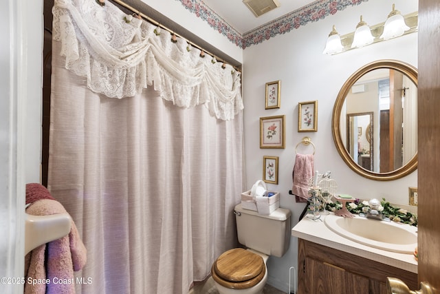 313 La Paloma Ln, Titusville, FL 32780 - bathroom featuring toilet and vanity