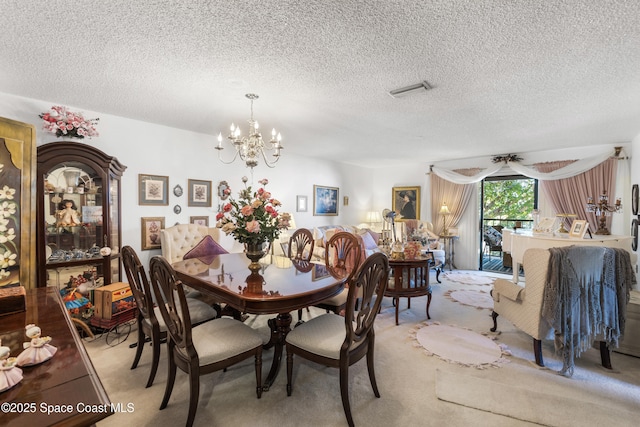 313 La Paloma Ln, Titusville, FL 32780 - dining space with a chandelier, a textured ceiling, and light carpet