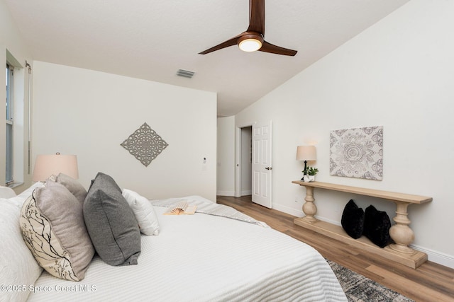 1471 Cypress Trace Dr, Melbourne, FL 32940 - bedroom with wood finished floors, lofted ceiling, and a ceiling fan