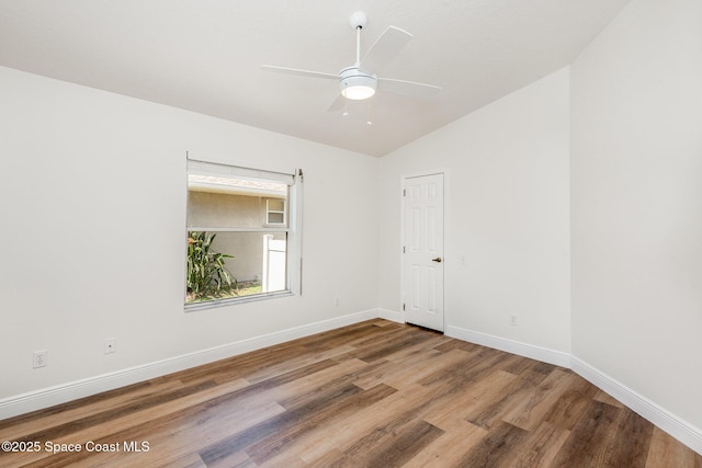 1471 Cypress Trace Dr, Melbourne, FL 32940 - unfurnished room featuring lofted ceiling, wood finished floors, and a ceiling fan