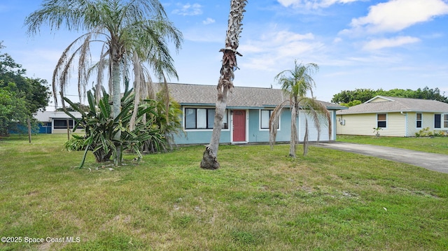 219 Fecco St, Cocoa, FL 32927 - single story home with driveway, a garage, and a front lawn