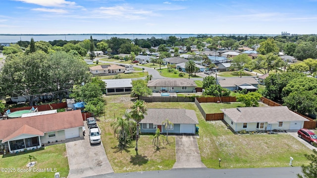 219 Fecco St, Cocoa, FL 32927 - aerial perspective of suburban area featuring a large body of water