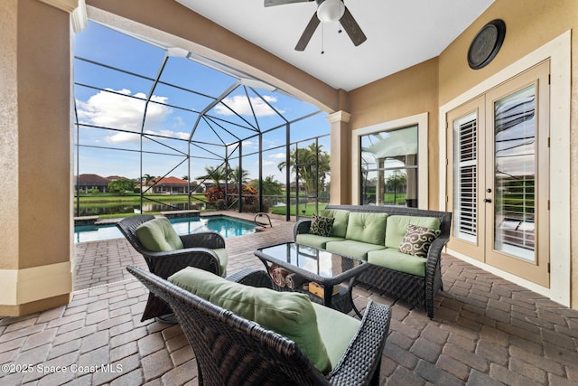 3079 Levanto Dr, Melbourne, FL 32940 - view of patio with french doors, a ceiling fan, outdoor lounge area, an outdoor pool, and glass enclosure