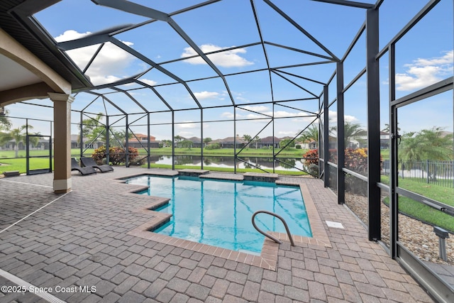 3079 Levanto Dr, Melbourne, FL 32940 - outdoor pool featuring a patio area, glass enclosure, and a water view
