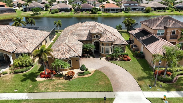 3079 Levanto Dr, Melbourne, FL 32940 - aerial view of residential area with a large body of water