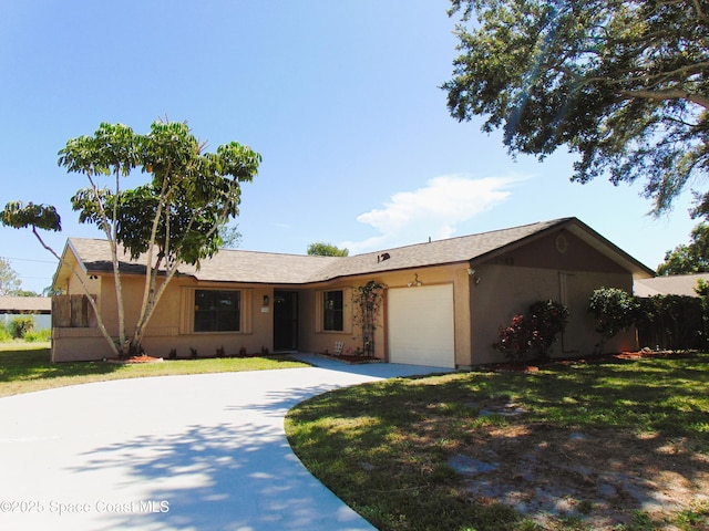 1943 Bradway St NE, Palm Bay, FL 32905 - ranch-style house with an attached garage, driveway, a front yard, and stucco siding