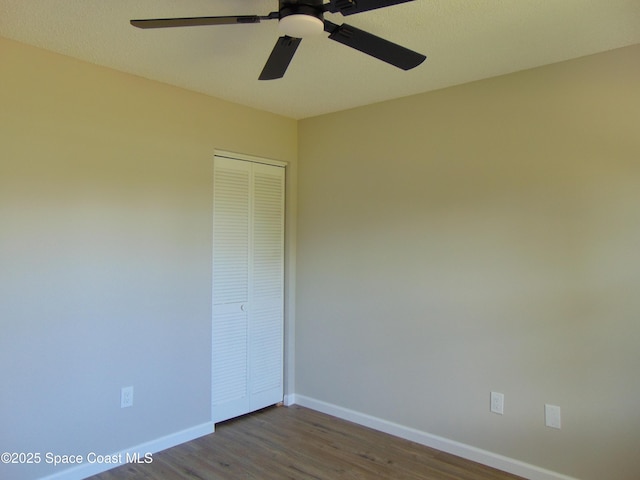 1943 Bradway St NE, Palm Bay, FL 32905 - unfurnished room featuring wood finished floors and ceiling fan