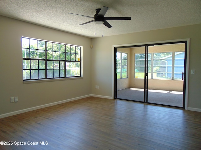 1943 Bradway St NE, Palm Bay, FL 32905 - spare room with wood finished floors, a textured ceiling, and ceiling fan
