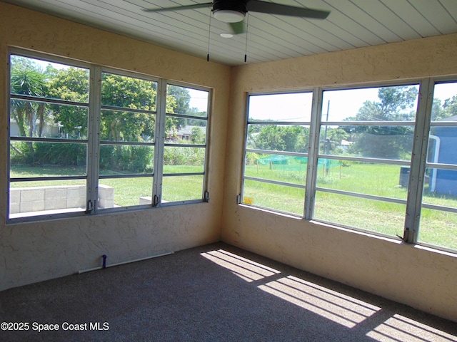 1943 Bradway St NE, Palm Bay, FL 32905 - unfurnished sunroom with a ceiling fan