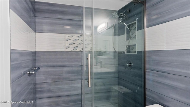 4800 Ocean Beach Blvd Unit 226, Cocoa Beach, FL 32931 - bathroom with a stall shower