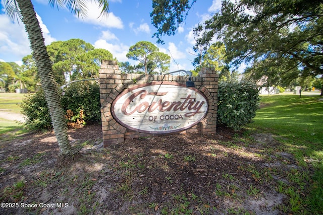 3104 Winchester Dr, Cocoa, FL 32926 - community / neighborhood sign featuring a lawn