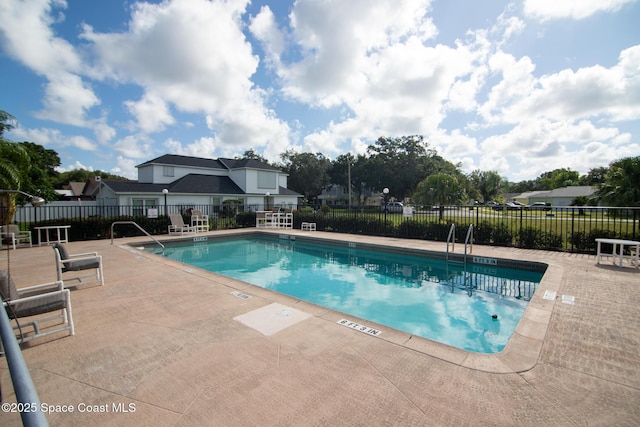 3104 Winchester Dr, Cocoa, FL 32926 - community pool with a patio area