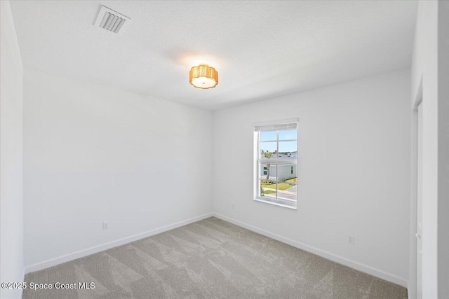 3538 Angler Dr, Ft Pierce, FL 34947 - unfurnished room featuring baseboards and carpet