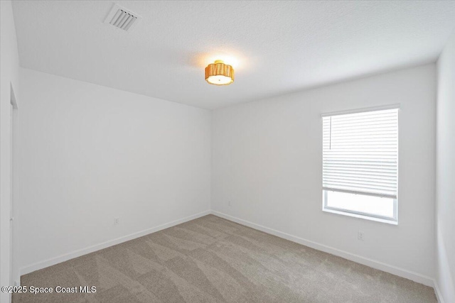 3538 Angler Dr, Ft Pierce, FL 34947 - unfurnished room with carpet flooring and baseboards