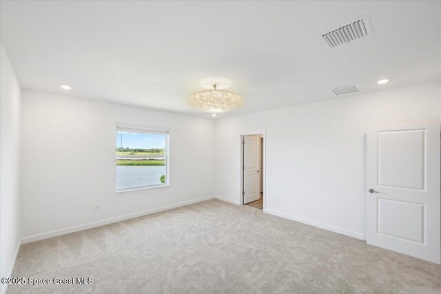 3538 Angler Dr, Ft Pierce, FL 34947 - carpeted empty room featuring recessed lighting