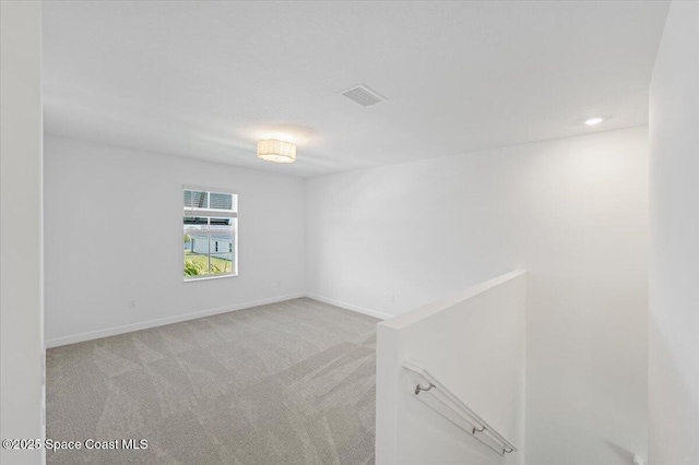 3538 Angler Dr, Ft Pierce, FL 34947 - spare room with light colored carpet and baseboards