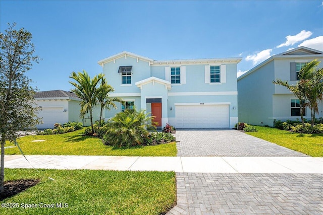 3538 Angler Dr, Ft Pierce, FL 34947 - traditional home with an attached garage, decorative driveway, and stucco siding
