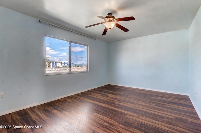 53 Emerald Ct, Satellite Beach, FL 32937 - spare room featuring a ceiling fan and wood finished floors