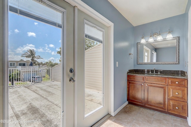 53 Emerald Ct, Satellite Beach, FL 32937 - bathroom featuring vanity and tile patterned flooring