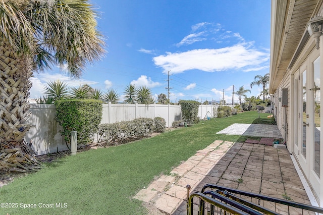 53 Emerald Ct, Satellite Beach, FL 32937 - fenced backyard with a patio