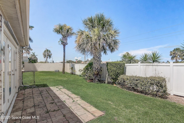 53 Emerald Ct, Satellite Beach, FL 32937 - fenced backyard featuring a patio