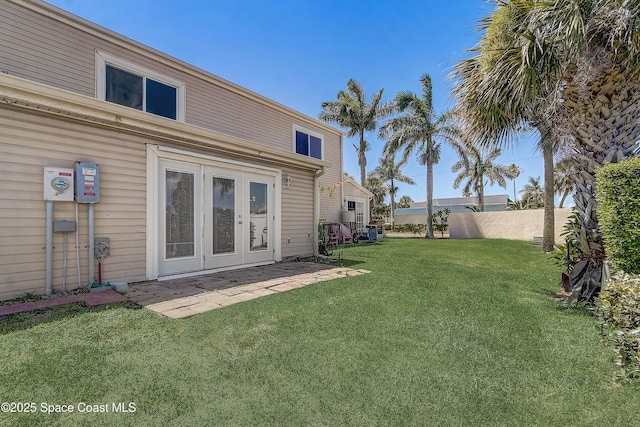 53 Emerald Ct, Satellite Beach, FL 32937 - view of yard with french doors