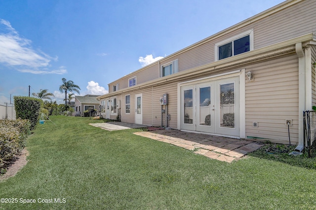 53 Emerald Ct, Satellite Beach, FL 32937 - rear view of property featuring a patio area and a yard
