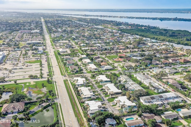 53 Emerald Ct, Satellite Beach, FL 32937 - aerial view of property and surrounding area with a large body of water and nearby suburban area