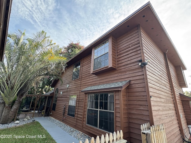 6860 Cairo Rd, Cocoa, FL 32927 - view of property exterior featuring a patio area