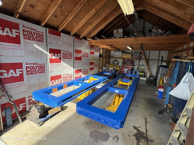 6860 Cairo Rd, Cocoa, FL 32927 - recreation room with vaulted ceiling and unfinished concrete floors