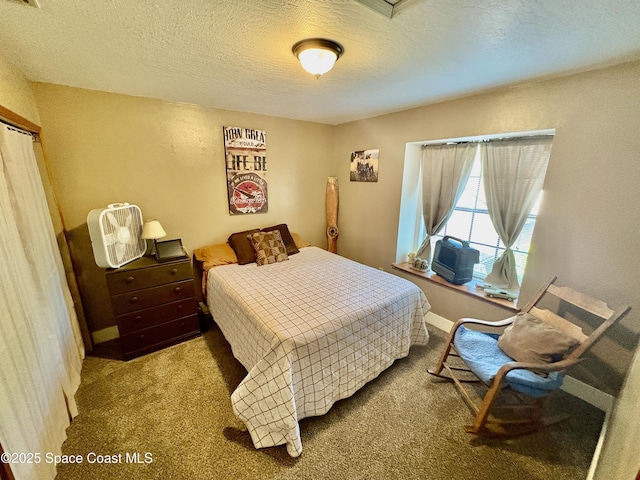 6860 Cairo Rd, Cocoa, FL 32927 - bedroom featuring a textured ceiling and carpet floors