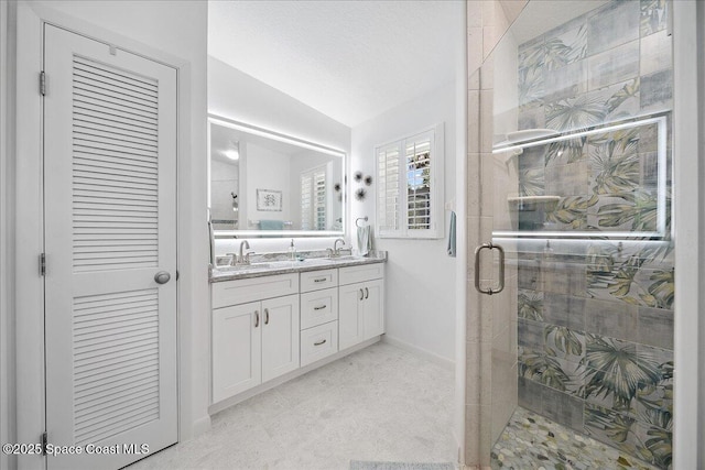 2310 Bignonia St, Melbourne, FL 32901 - full bath featuring double vanity, a stall shower, and lofted ceiling