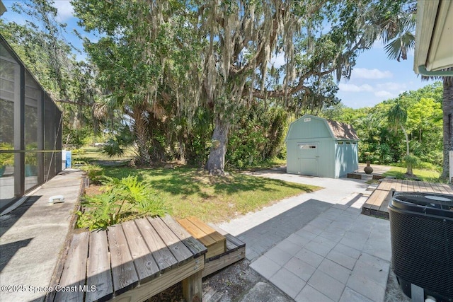 2310 Bignonia St, Melbourne, FL 32901 - view of patio / terrace featuring a storage shed