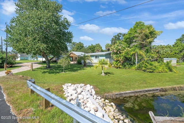 2310 Bignonia St, Melbourne, FL 32901 - view of front of home featuring a front lawn
