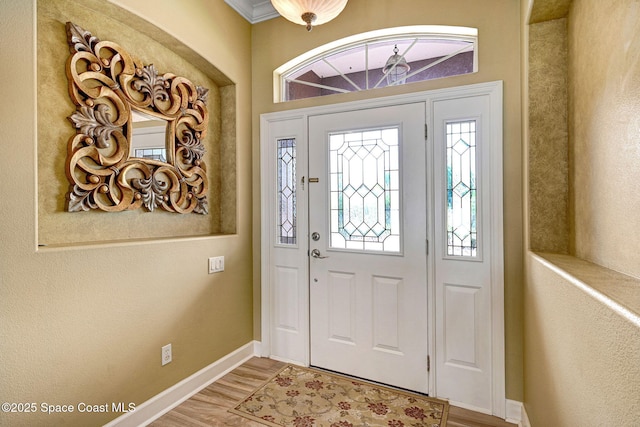 2604 Canary Isles Dr, Melbourne, FL 32901 - foyer entrance featuring baseboards and light wood-type flooring