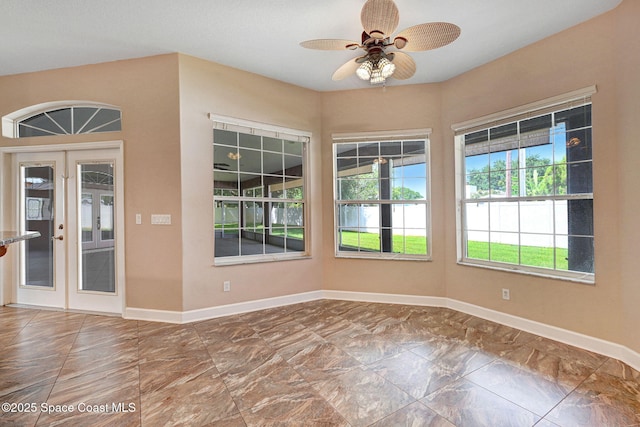 2604 Canary Isles Dr, Melbourne, FL 32901 - empty room featuring a ceiling fan and french doors